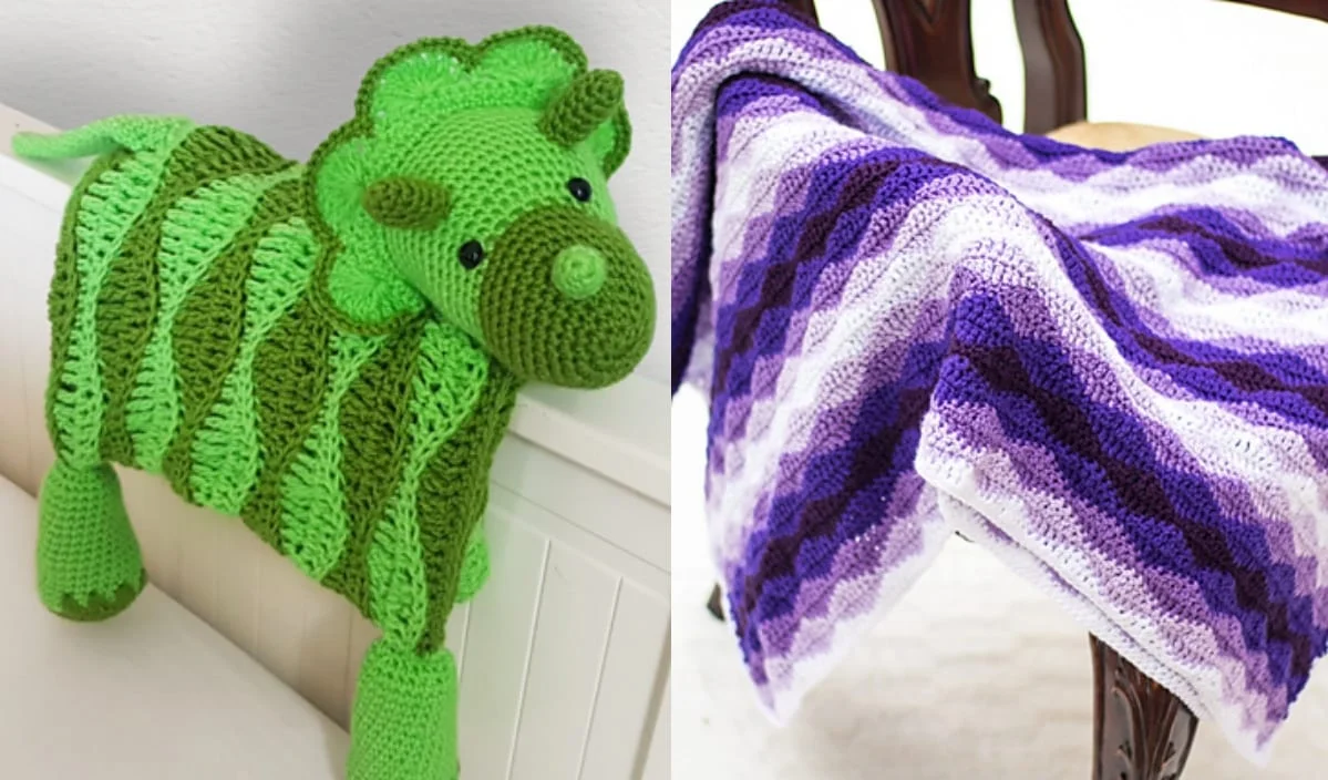 A green crocheted dinosaur crafted with the rolling waves stitch drapes over a white surface on the left, while a purple checkered blanket graces the chair on the right.