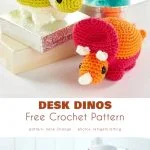 Three colorful crochet baby dinos are displayed on books and a desk.