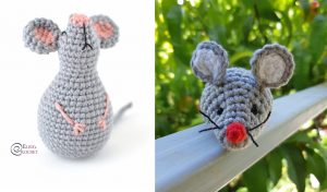 Two crocheted little mouse toys: one stands upright with a pink nose and the other rests on a railing with a red nose, surrounded by greenery.