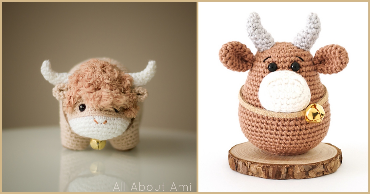 Two handmade amigurumi bulls: one fuzzy beige and white with a bell, the other light brown with horns, sitting on a wooden base also adorned with a bell—both crafted from an exquisite ox crochet pattern.