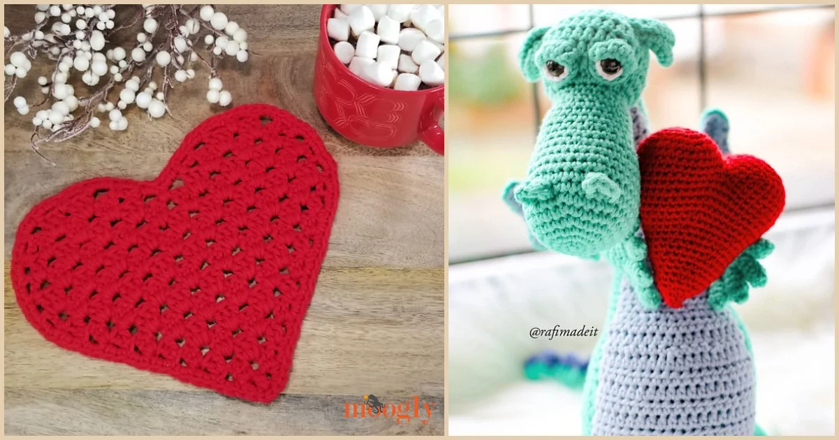 A red crocheted heart mat cozily sits beside a mug with marshmallows, embodying a hearty project. On the right, a green and blue crochet dragon lovingly holds another red heart.