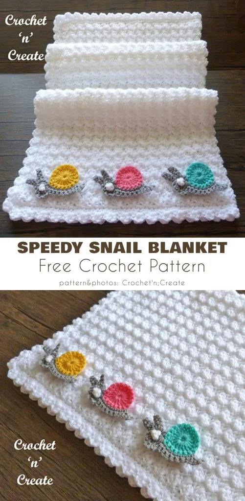 A white crocheted blanket with a textured pattern and colorful snail appliques along the edge, displayed folded and laid flat. Text reads "Speedy Snail Blanket." Perfect for those seeking crochet baby blanket patterns free!.