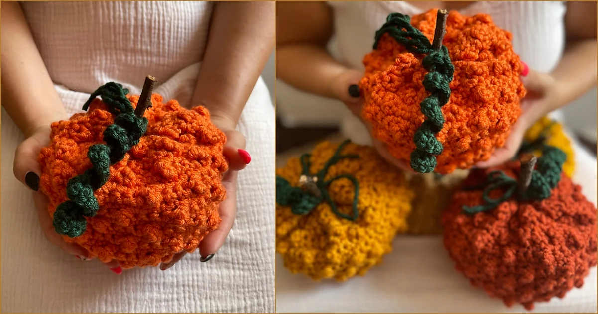 Hands holding a crocheted pumpkin with a green stem, perfect for fall-themed projects. Additional crocheted pumpkins in orange, yellow, and rust create a cozy autumn backdrop.