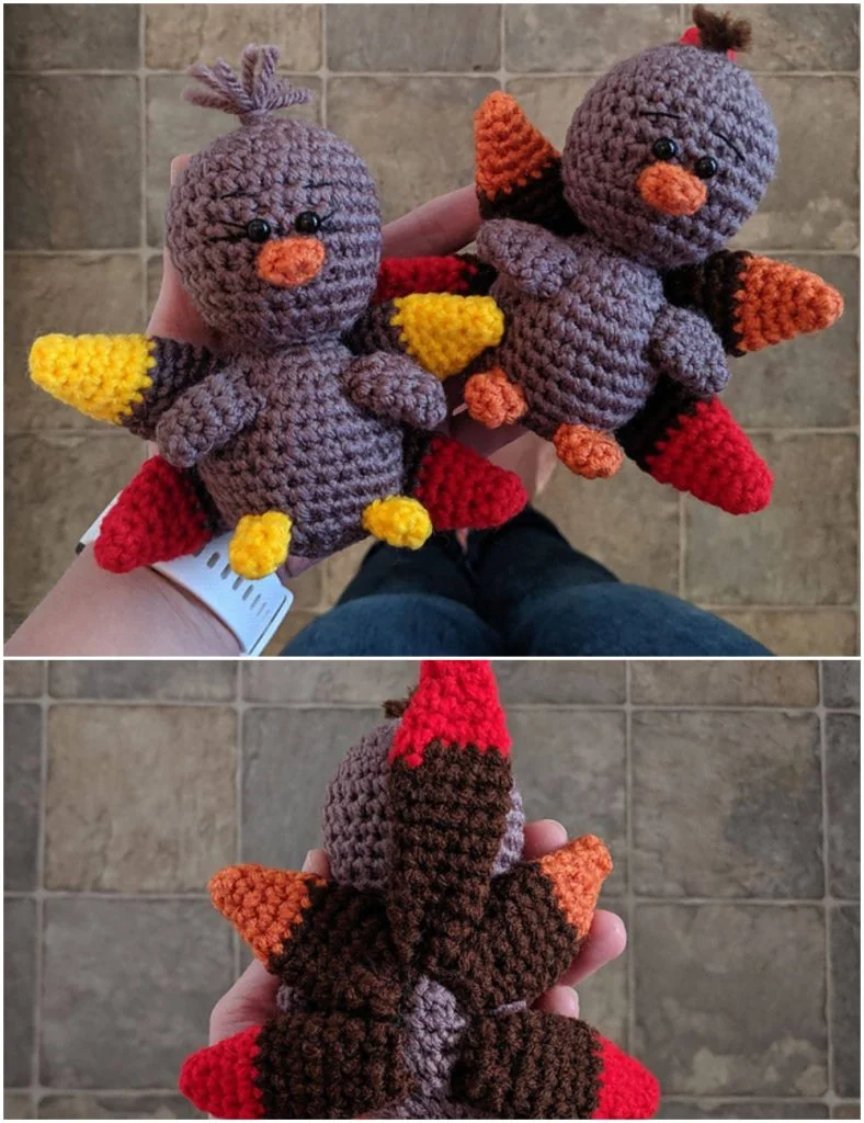 Two hand-held amigurumi turkey dolls with colorful wings, shown from the front and back, against a tiled floor background.
