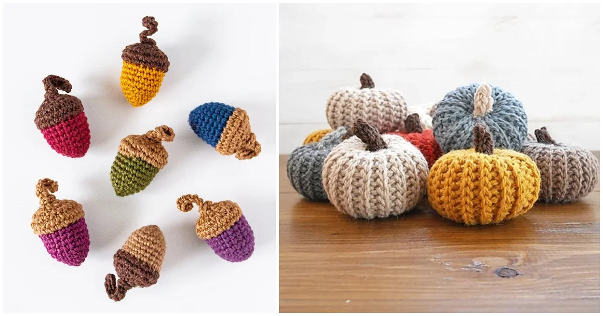 Crocheted acorns and pumpkins in various colors are beautifully displayed on a wooden surface, surrounded by vibrant fall leaves.