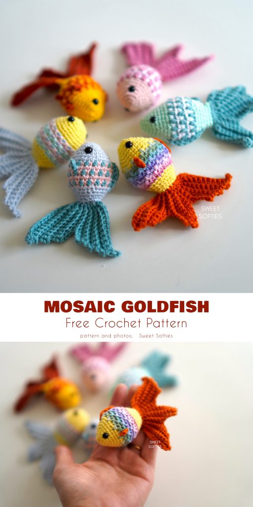 Hand holding a colorful crocheted goldfish, with several crocheted goldfish of various colors displayed on a white surface in the background, reminiscent of the vibrant patterns seen in a mosaic blanket.