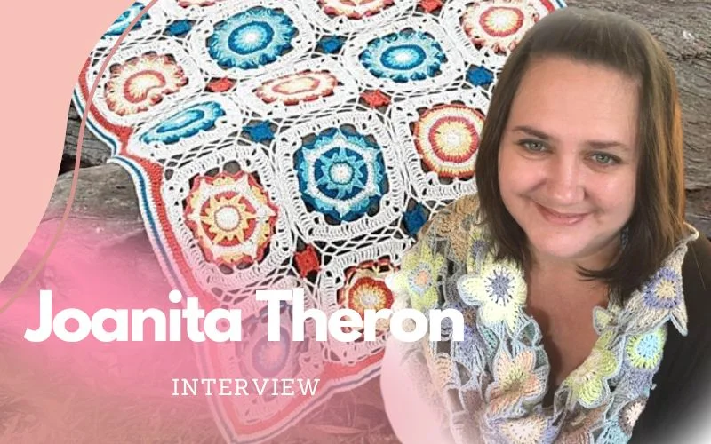 A beaming woman poses in front of a vibrant crocheted blanket, embodying the spirit of creativity. Text overlay reads "Joanita Theron Interview.