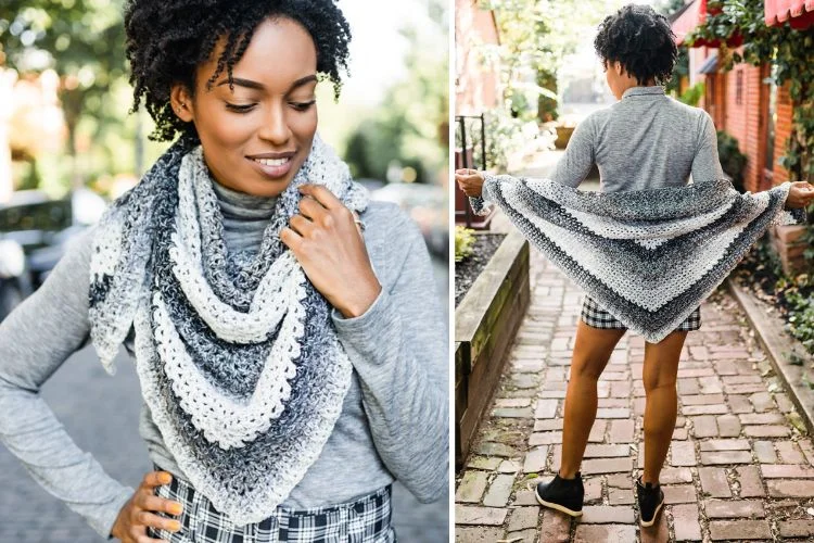 A woman wearing a grey and white crocheted shawl.