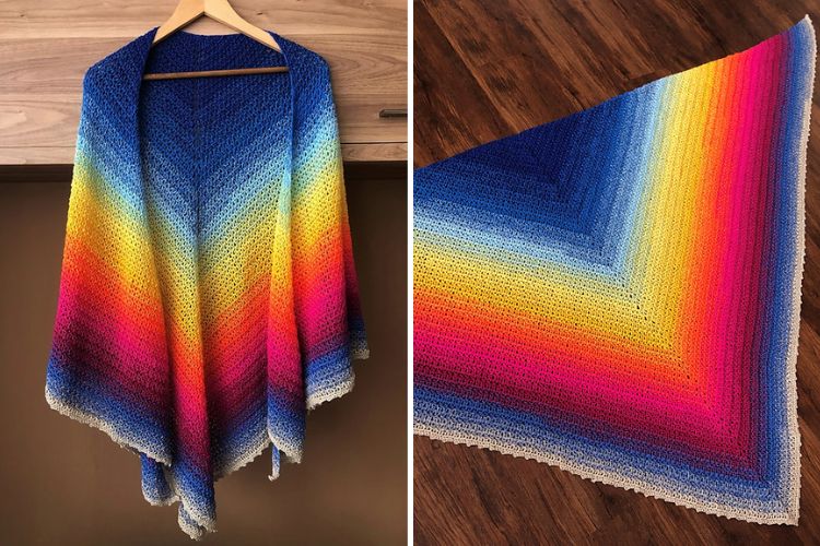 A crocheted rainbow shawl hanging on a hanger.