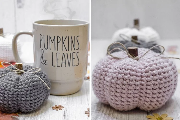 Crocheted pumpkins with a mug next to them.