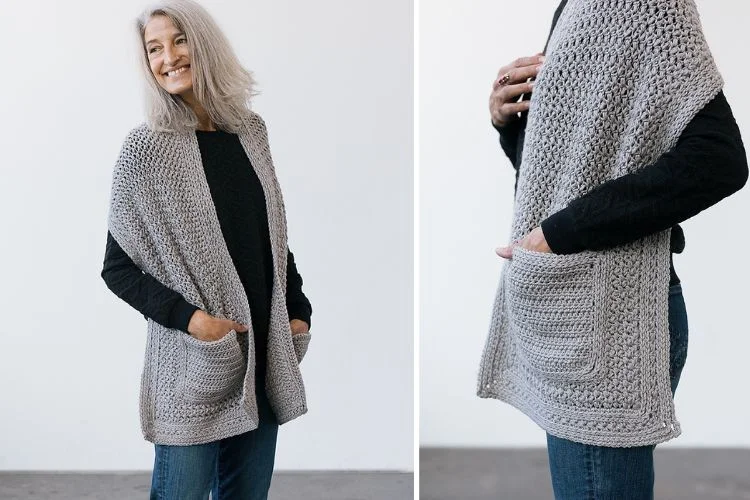 A woman wearing a grey knitted cardigan.