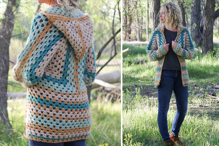 A woman wearing a crocheted cardigan in the woods.