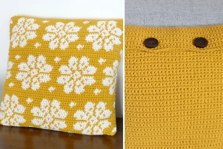 A yellow and white crocheted pillow with a button.