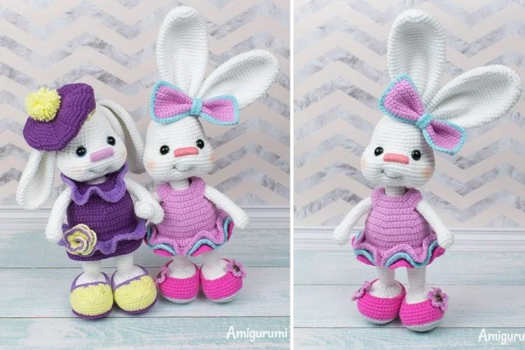 Two crocheted bunnies in pink and purple outfits.