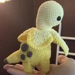 a crochet brontosaurs looking like a banana