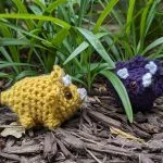 two small crochet triceraptops