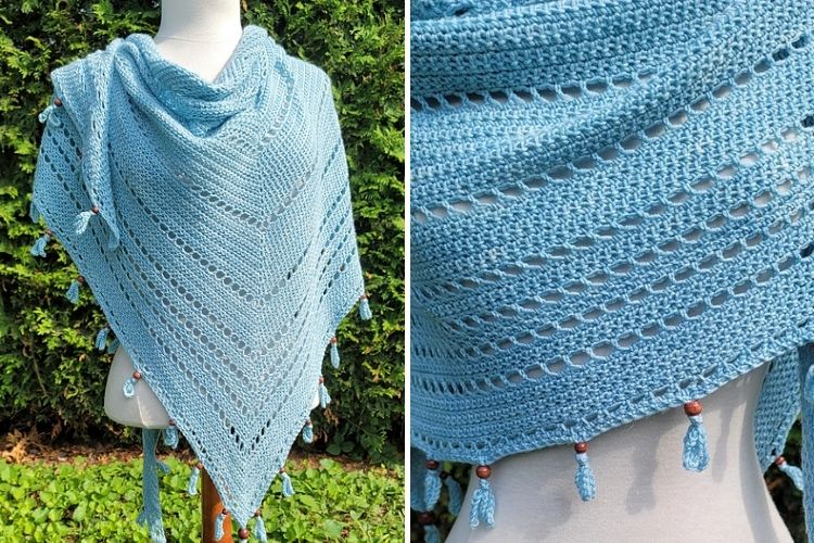 A light blue crocheted shawl with tassels.