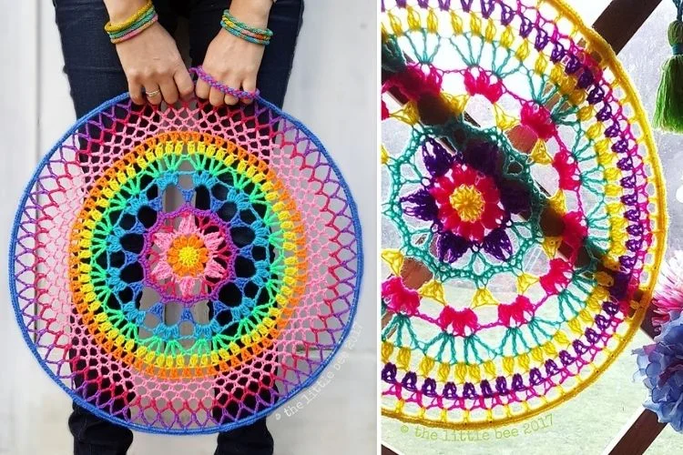 A woman is holding a colorful crocheted circle.