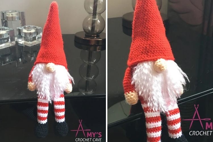 A crocheted gnome with red and white stripes.