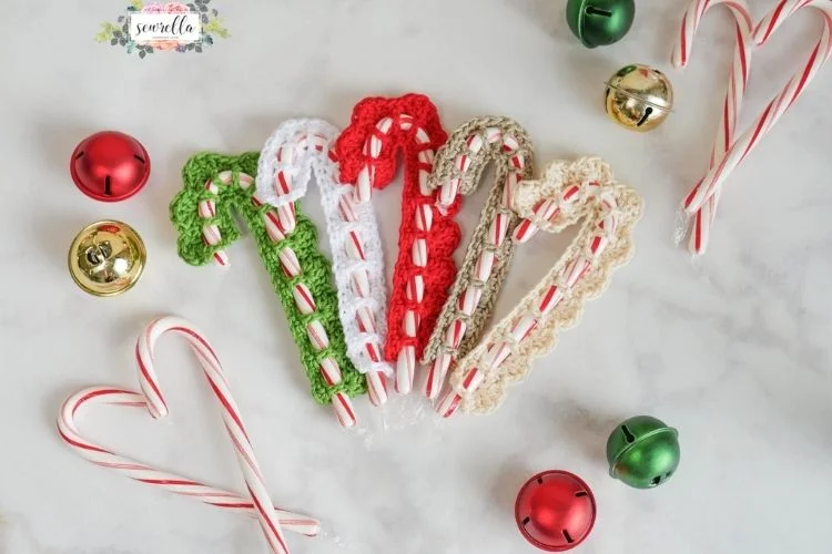 Crocheted candy canes and christmas ornaments.