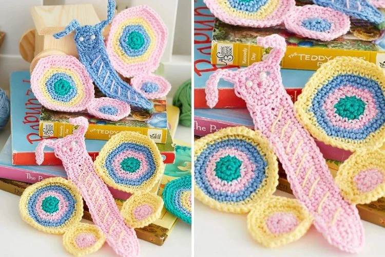 Crocheted butterfly bookmarks on a bookshelf.