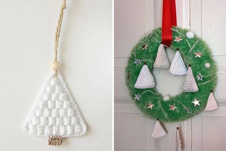 A white christmas wreath and a crocheted christmas tree hanging on a door.