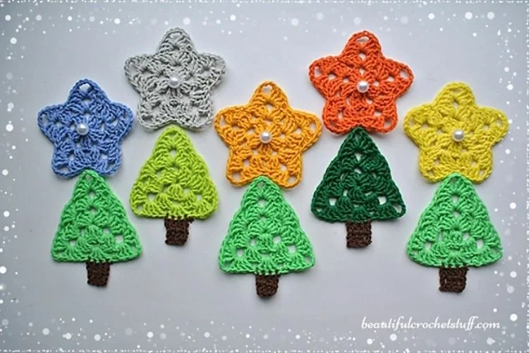 Crocheted christmas tree ornaments in different colors.