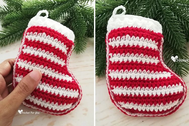 a crochet christmas stocking ornament with a striped design in red and white