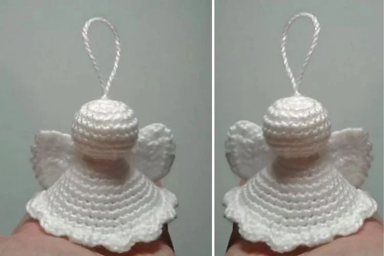 Two crocheted angel ornaments in a person's hand.