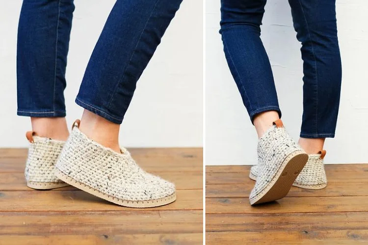 A pair of crocheted espadrilles on a woman's feet.