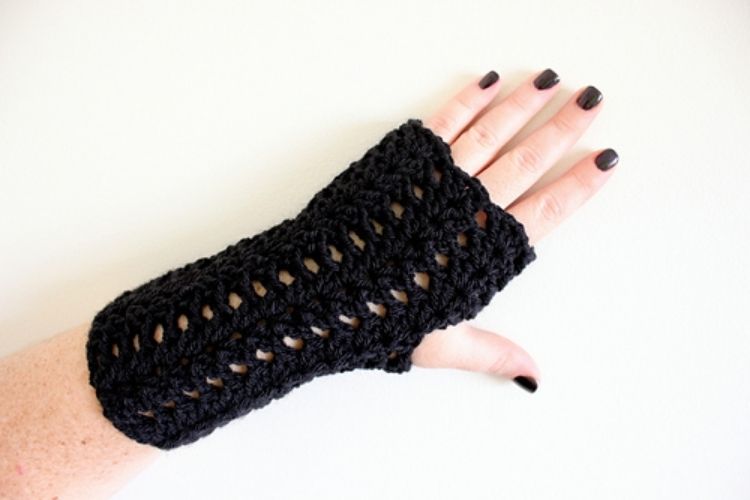 Black crocheted fingerless gloves.