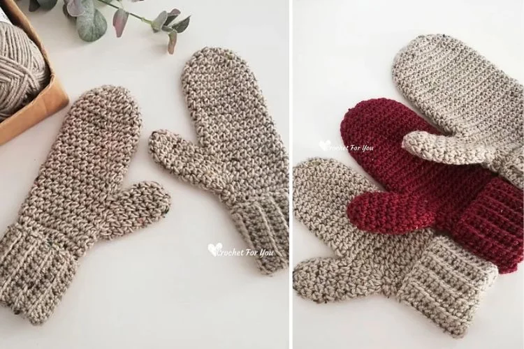 Crocheted mittens with yarn and knitting needles.