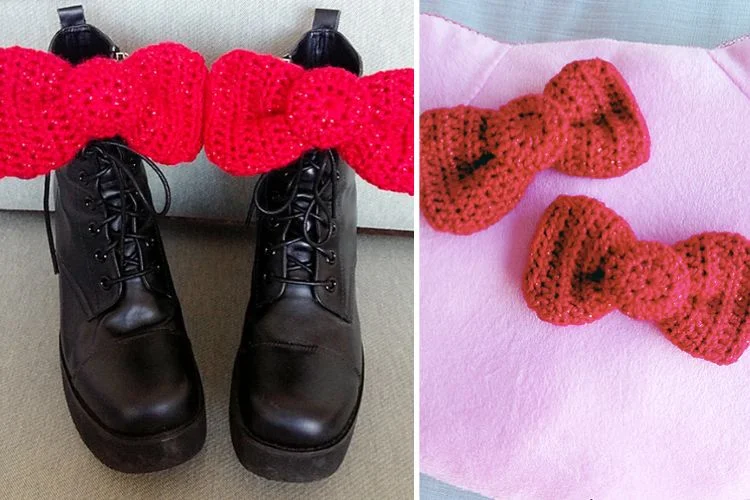 A pair of crocheted bows and a pair of black boots.