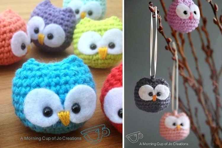 Crocheted owl ornaments hanging on a branch.