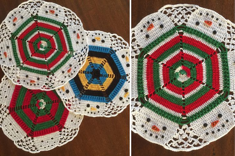 A set of crocheted doilies on a table.