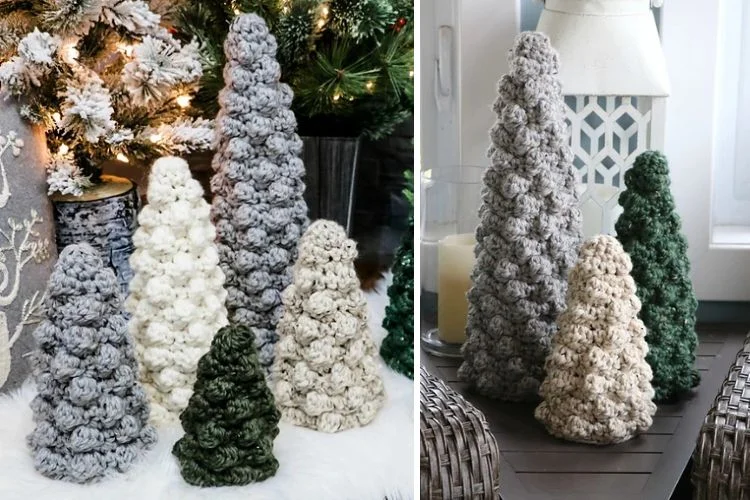 Crocheted christmas trees on a table in front of a christmas tree.