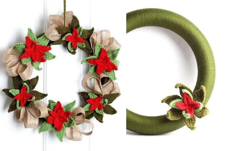 A green wreath with red poinsettias on it.