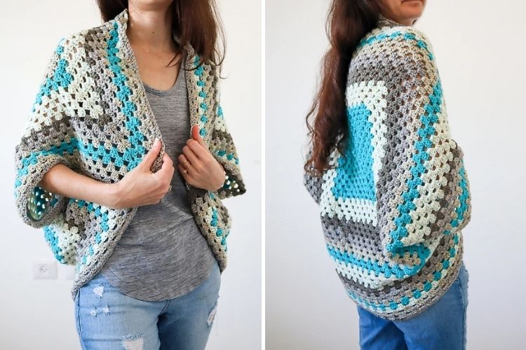 A woman is wearing a crocheted cardigan.