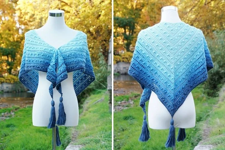 Two pictures of a blue shawl with tassels.