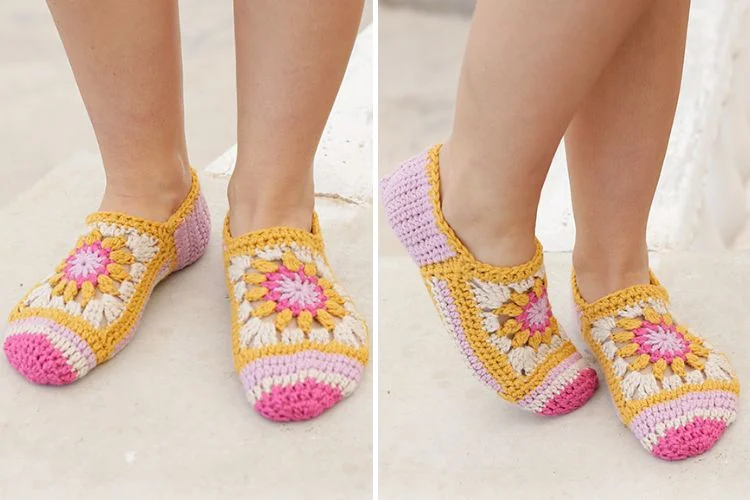 A pair of yellow and pink crocheted slippers.