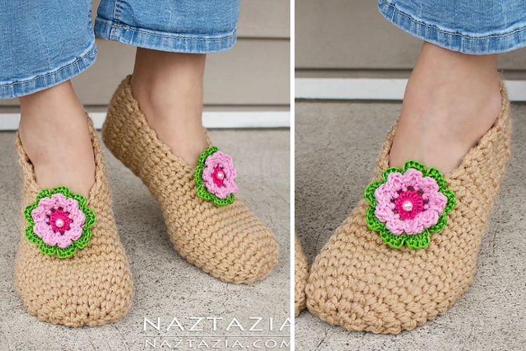 A pair of crocheted slippers with a flower on them.