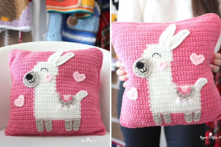 A crocheted pillow with a llama on it.