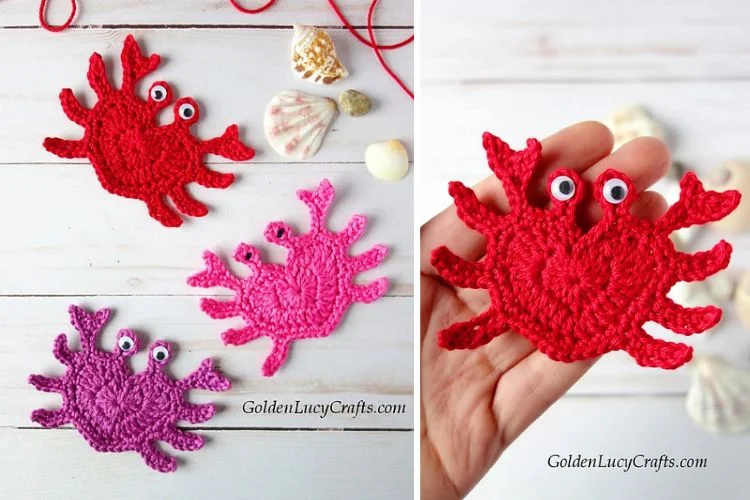 A hand holding a crochet crab.