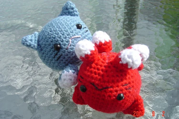 A blue and red stuffed animals.