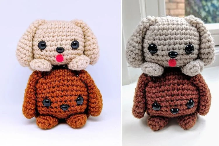 Two crocheted amigurumi dogs sitting on top of each other.