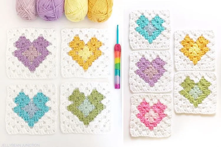 A set of crocheted heart shaped squares with yarn and crochet hooks.