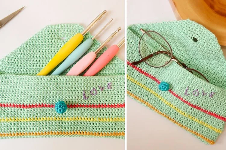 A crocheted pouch with a pair of scissors and a pair of scissors.