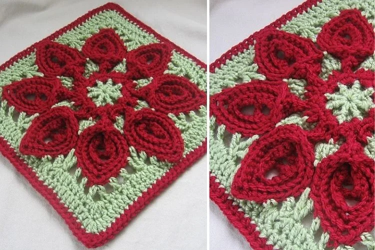 Handcrafted red and green crochet granny square with a floral pattern design.