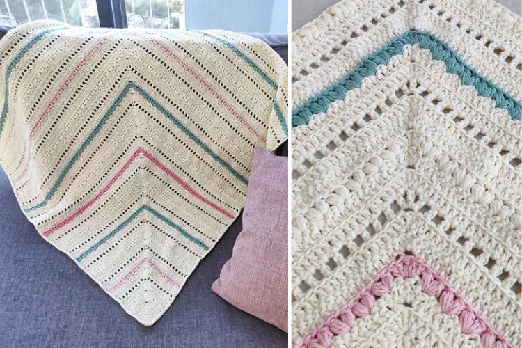 Handmade crocheted blanket with multicolored stripes displayed on a couch.