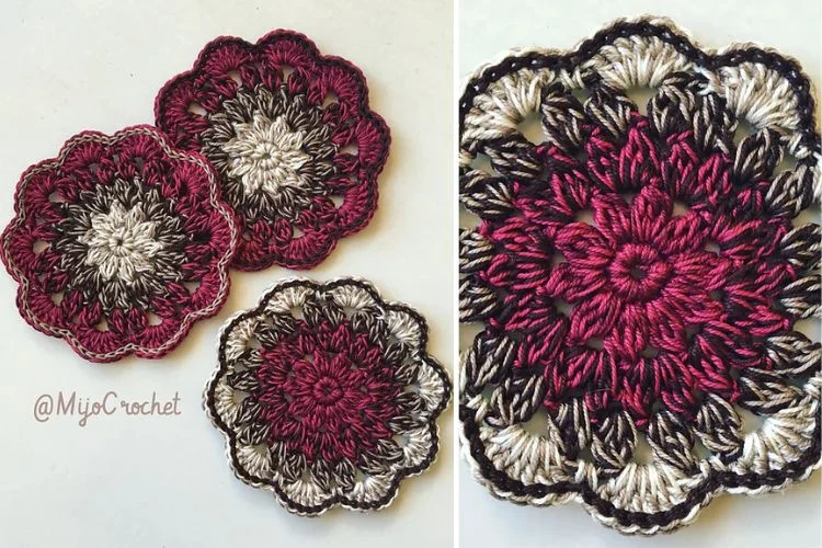 A set of crocheted flower coasters on a table.